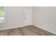 Entryway with a window, white door, and vinyl floors at 144 Holly Mountain Rd, Holly Springs, NC 27540