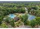Aerial view of the community amenities including the pool, playground, clubhouse and tennis courts at 15 Aman Ct, Durham, NC 27713
