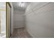 Organized walk-in closet featuring metal shelving and ample storage space at 15 Aman Ct, Durham, NC 27713