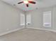 An empty bedroom with carpet, light colored walls and a ceiling fan at 151 Cobble Ridge Dr, Pittsboro, NC 27312