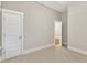 Bright bedroom with neutral paint, white trim, and carpet at 151 Cobble Ridge Dr, Pittsboro, NC 27312