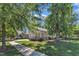 Scenic view of the home nestled in a well-maintained community with lush green lawns at 151 Cobble Ridge Dr, Pittsboro, NC 27312