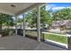 Inviting front porch featuring black railings and sturdy white columns, perfect for enjoying the outdoors at 151 Cobble Ridge Dr, Pittsboro, NC 27312
