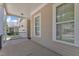Spacious front porch with sturdy pillars, offering a perfect spot for relaxation and enjoying neighborhood views at 151 Cobble Ridge Dr, Pittsboro, NC 27312