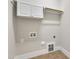 An empty laundry room with white trim and tile flooring at 151 Cobble Ridge Dr, Pittsboro, NC 27312