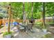 Backyard featuring a patio with a seating area, a dog house, and an above-ground swimming pool at 1703 Keogh St, Burlington, NC 27215