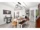 Open dining room featuring a farmhouse table, seating, and rustic accents at 1703 Keogh St, Burlington, NC 27215
