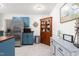 Stylish kitchen with blue cabinets, stainless steel appliances, and tile flooring at 1703 Keogh St, Burlington, NC 27215