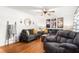 Cozy living room with hardwood floors, neutral walls, and comfortable furnishings at 1703 Keogh St, Burlington, NC 27215