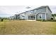 Backyard with covered patio with view of neighborhood at 1740 Golden Honey Dr, Wake Forest, NC 27587