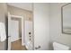 Neutral bathroom featuring bathtub and toilet at 1740 Golden Honey Dr, Wake Forest, NC 27587