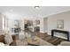 Open concept living room and kitchen with hardwood floors and recessed lighting at 1740 Golden Honey Dr, Wake Forest, NC 27587