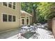 The wooden deck has plenty of space for an outdoor dining set and lounge seating at 201 Red Bud Ln, Chapel Hill, NC 27514