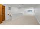 Bonus room featuring neutral carpet, natural light, and a staircase at 201 Red Bud Ln, Chapel Hill, NC 27514