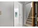 Hallway with carpeted stairs leading to a living space at 201 Red Bud Ln, Chapel Hill, NC 27514