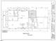 Detailed first floor plan featuring a kitchen, Gathering room, dining area, office, and two-car garage at 203 E Winmore Ave, Chapel Hill, NC 27516