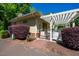 Community pool entrance with pergola, restricted access gate and pool rules posted at 203 E Winmore Ave, Chapel Hill, NC 27516