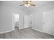Bedroom showcasing ceiling fan and multiple doorways at 208 W Holt St, Burlington, NC 27217