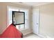 Bedroom with neutral walls and a window at 2193 Boyd Creek Dr, Graham, NC 27253