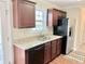 Beautiful kitchen with granite countertops, wooden cabinetry, and stainless steel appliances at 2193 Boyd Creek Dr, Graham, NC 27253