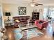 Comfortable living room featuring hardwood floors, neutral walls, and stylish furnishings at 2193 Boyd Creek Dr, Graham, NC 27253