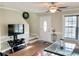 Cozy living room space leading to staircase, with stylish decor and ample natural light at 2193 Boyd Creek Dr, Graham, NC 27253