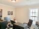 Home office features large windows and neutral walls at 2193 Boyd Creek Dr, Graham, NC 27253