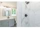 Updated bathroom featuring a sink vanity and marble tiled shower at 2300 Radius Cir, Sanford, NC 27330