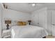 Bedroom with ceiling fan features a closet and neutral decor at 24 W Canterbury Ct, Wendell, NC 27591