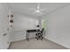 Bright bedroom with a ceiling fan, a window, and a black desk with rolling chair at 24 W Canterbury Ct, Wendell, NC 27591