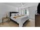 Bright bedroom features a ceiling fan, two windows, and neutral decor at 24 W Canterbury Ct, Wendell, NC 27591