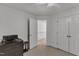 Bedroom featuring a dresser, two closets, and a view into the hallway at 24 W Canterbury Ct, Wendell, NC 27591