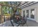 Covered patio dining area, perfect for enjoying outdoor meals and gatherings at 24 W Canterbury Ct, Wendell, NC 27591