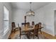 Formal dining room featuring a decorative table with seating for six at 24 W Canterbury Ct, Wendell, NC 27591