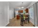 Bright kitchen with wooden cabinets, stainless steel appliances, and a breakfast nook area at 24 W Canterbury Ct, Wendell, NC 27591