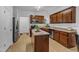 Spacious kitchen with island, stainless steel appliances, and plenty of storage at 24 W Canterbury Ct, Wendell, NC 27591