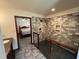 Modern bathroom boasting a beautiful tile shower with bench and black hardware at 2483 Mcneill Hobbs Rd, Bunnlevel, NC 28323
