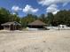 This home boasts a large outdoor entertaining area at 2483 Mcneill Hobbs Rd, Bunnlevel, NC 28323