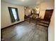 Bright living area with access to the dining room and a large window at 2483 Mcneill Hobbs Rd, Bunnlevel, NC 28323
