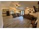 Open living room featuring a high ceiling, tile floors and comfortable seating area at 2483 Mcneill Hobbs Rd, Bunnlevel, NC 28323