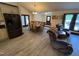 Living room and dining area combo with tile flooring, open to kitchen at 2483 Mcneill Hobbs Rd, Bunnlevel, NC 28323