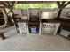 Well-appointed outdoor kitchen features stainless steel appliances and stone accents, perfect for entertaining at 2483 Mcneill Hobbs Rd, Bunnlevel, NC 28323