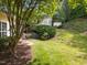 Scenic backyard with lush greenery and mature trees at 2536 Bent Green St, Raleigh, NC 27614