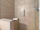 Modern bathroom with tiled shower and grab bar at 2536 Bent Green St, Raleigh, NC 27614