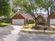 Charming home with a brick and siding exterior, well-manicured lawn, and a two-car garage at 2536 Bent Green St, Raleigh, NC 27614