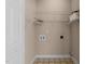 Functional laundry room with shelving for storage at 2536 Bent Green St, Raleigh, NC 27614