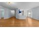 Open-concept living area with hardwood floors and a view of the kitchen at 2536 Bent Green St, Raleigh, NC 27614