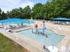 Community pool area featuring a splash pool and ample seating at 2536 Bent Green St, Raleigh, NC 27614
