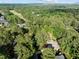Aerial shot showcasing the home's location nestled among lush greenery at 266 Hogans Valley Way, Cary, NC 27513