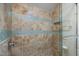 Shower features tile walls with decorative accents, glass door, and a built-in niche at 266 Hogans Valley Way, Cary, NC 27513